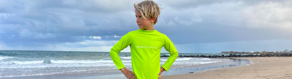 Bright lime green rash top for water safety from Tribe Tropical