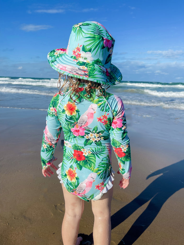 stylish sun protective swimwear for girls of all ages. Sun safe swimwear for babies, toddlers, girls, boys, teenagers and ladies. Nappy diaper change clips on baby swimwear.