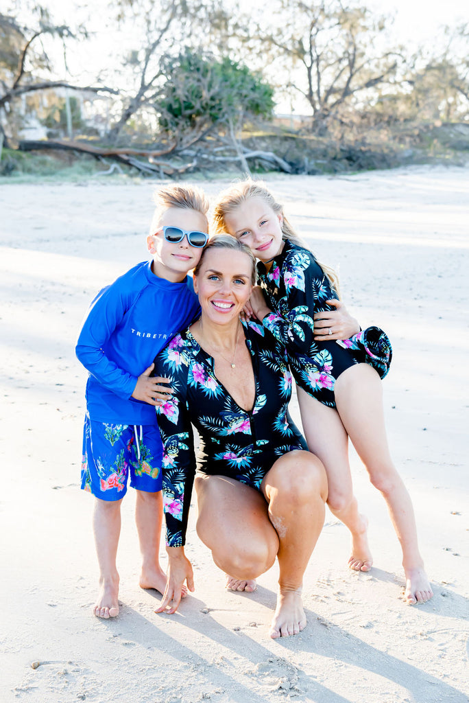 family matching swimwear on tropical Australian prints 